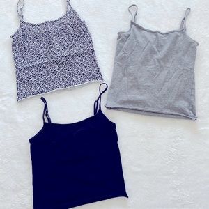 Three cropped tanks